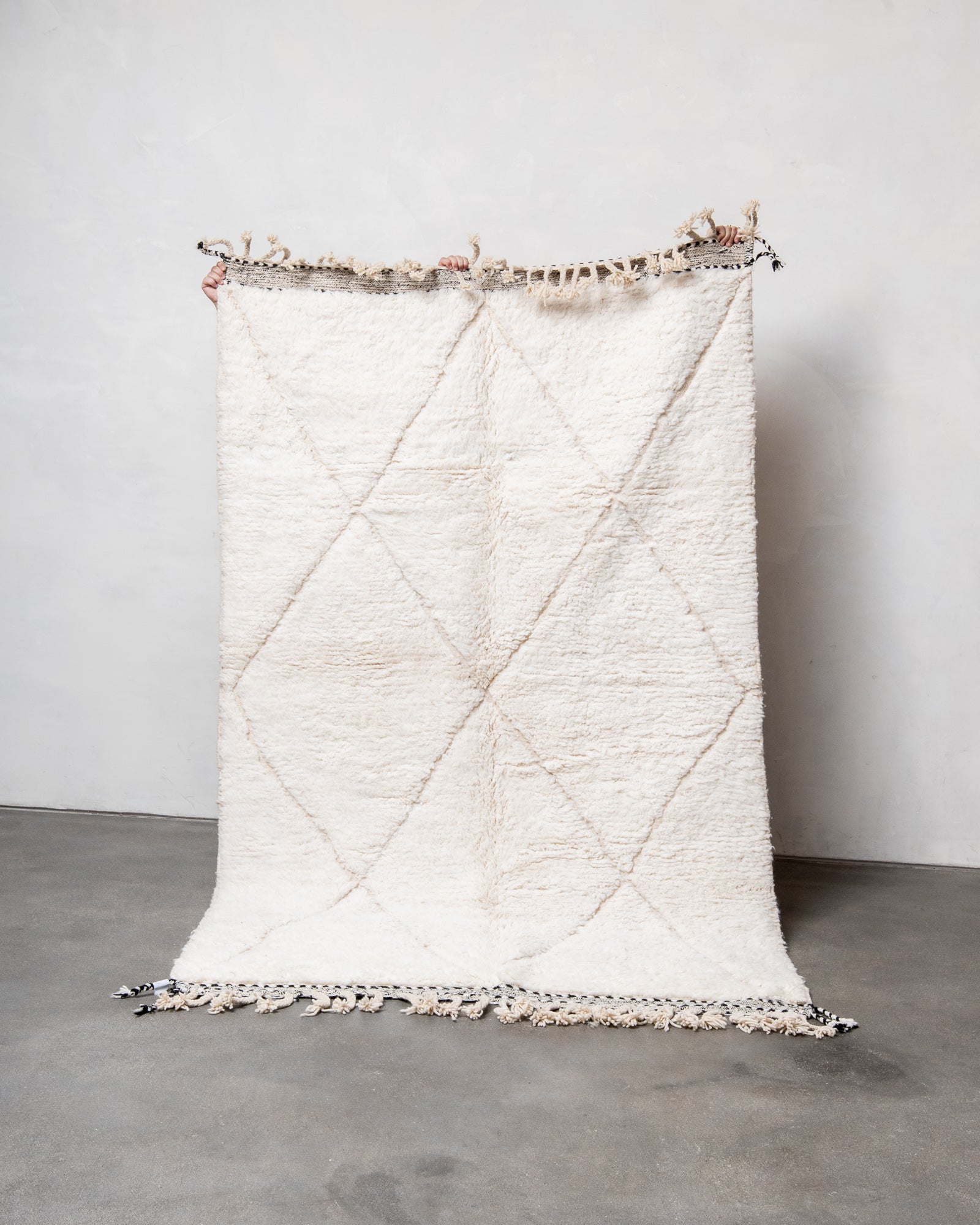 Modern, designer, handcrafted Berber rug from Morocco. Beniourain carpet with beautiful colours and patterns and fluffy wool texture.